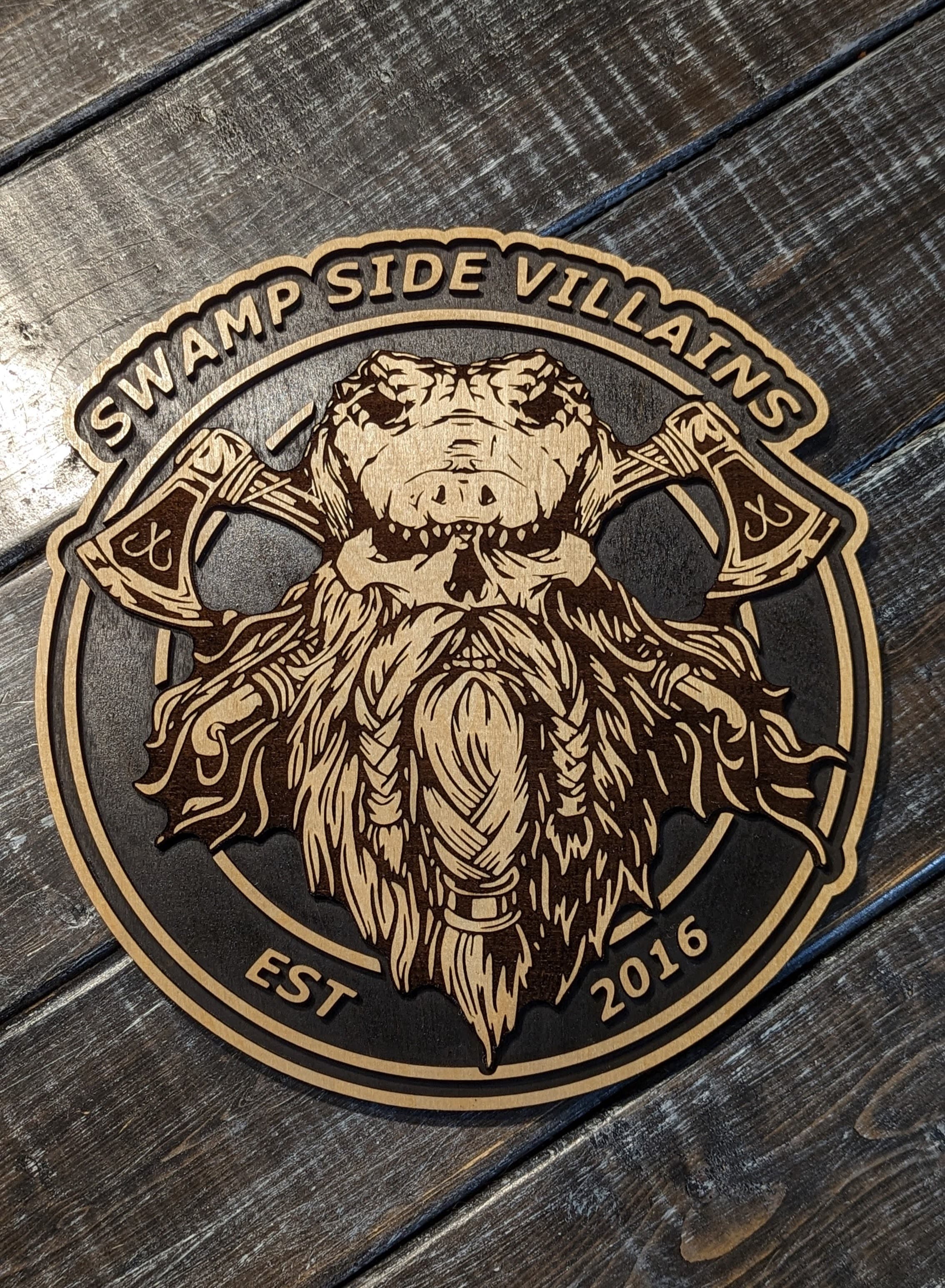 Round engraved club plaque with high-contrast layered detail