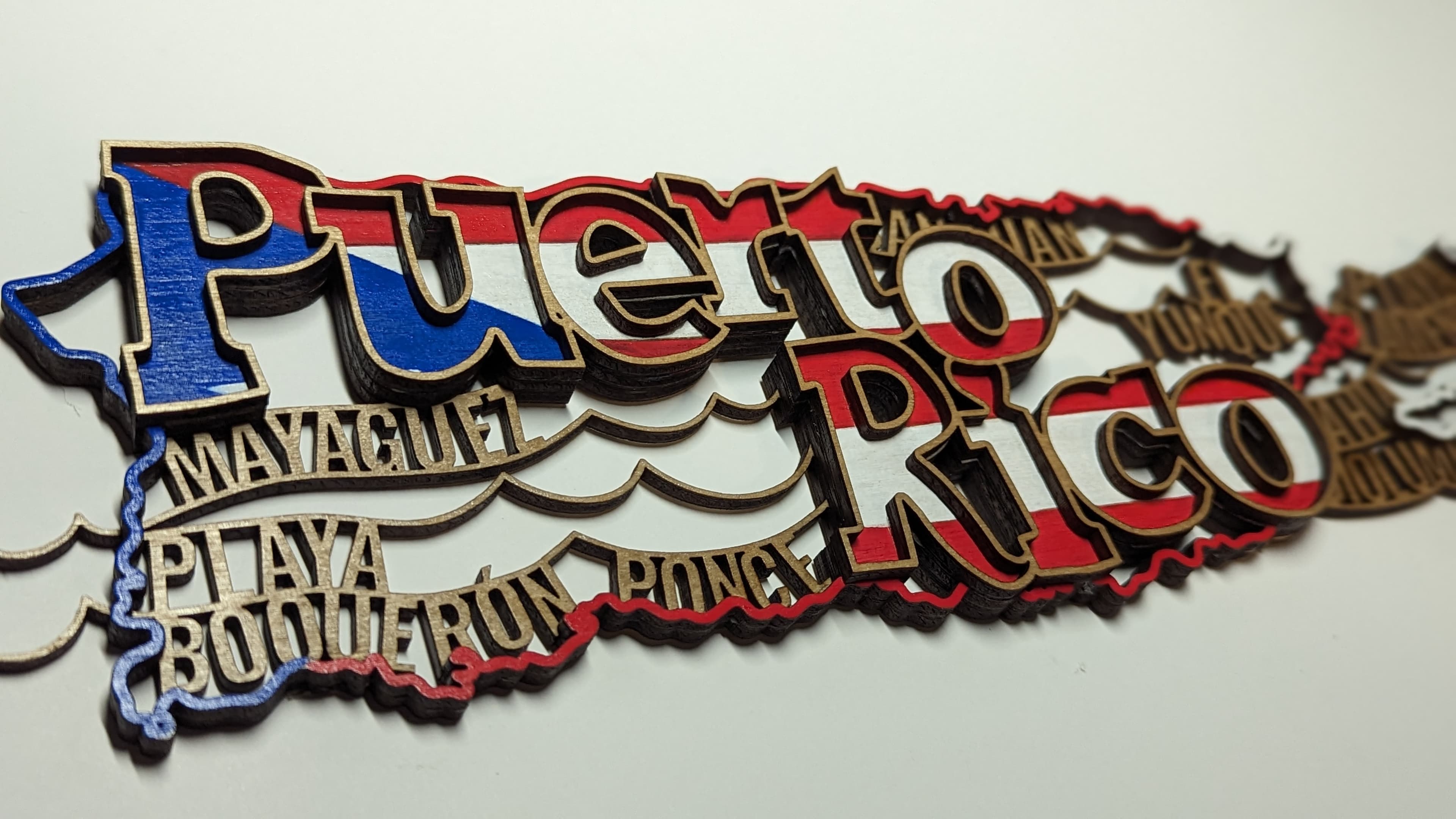 Dimensional Puerto Rico custom sign with layered city names and color
