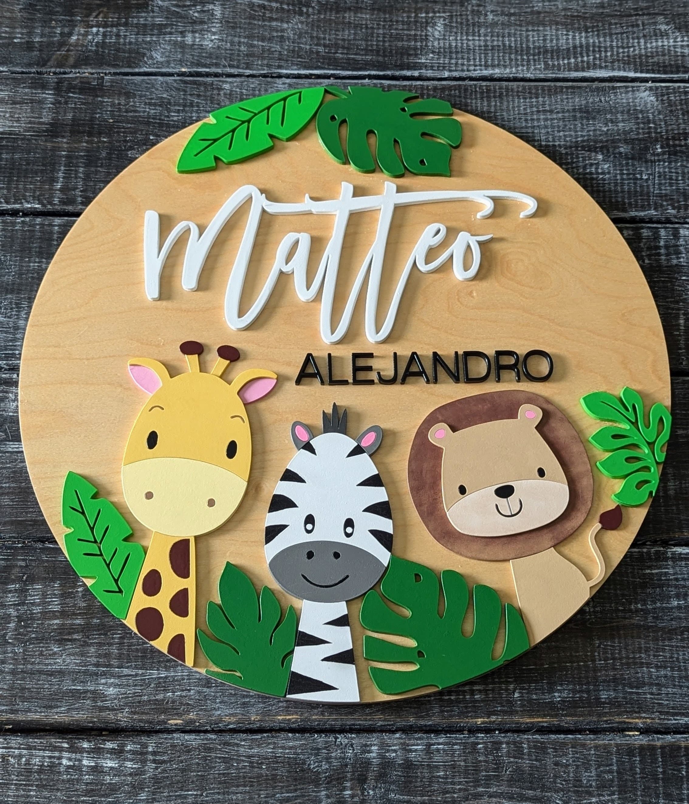 Round safari nursery sign with animal accents and raised name lettering