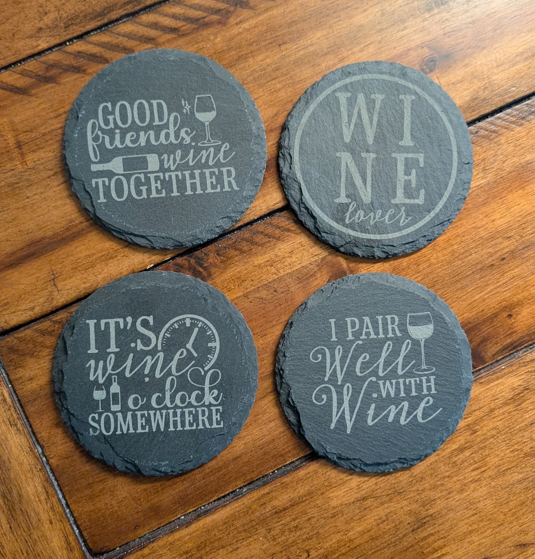 Set of engraved slate wine coasters